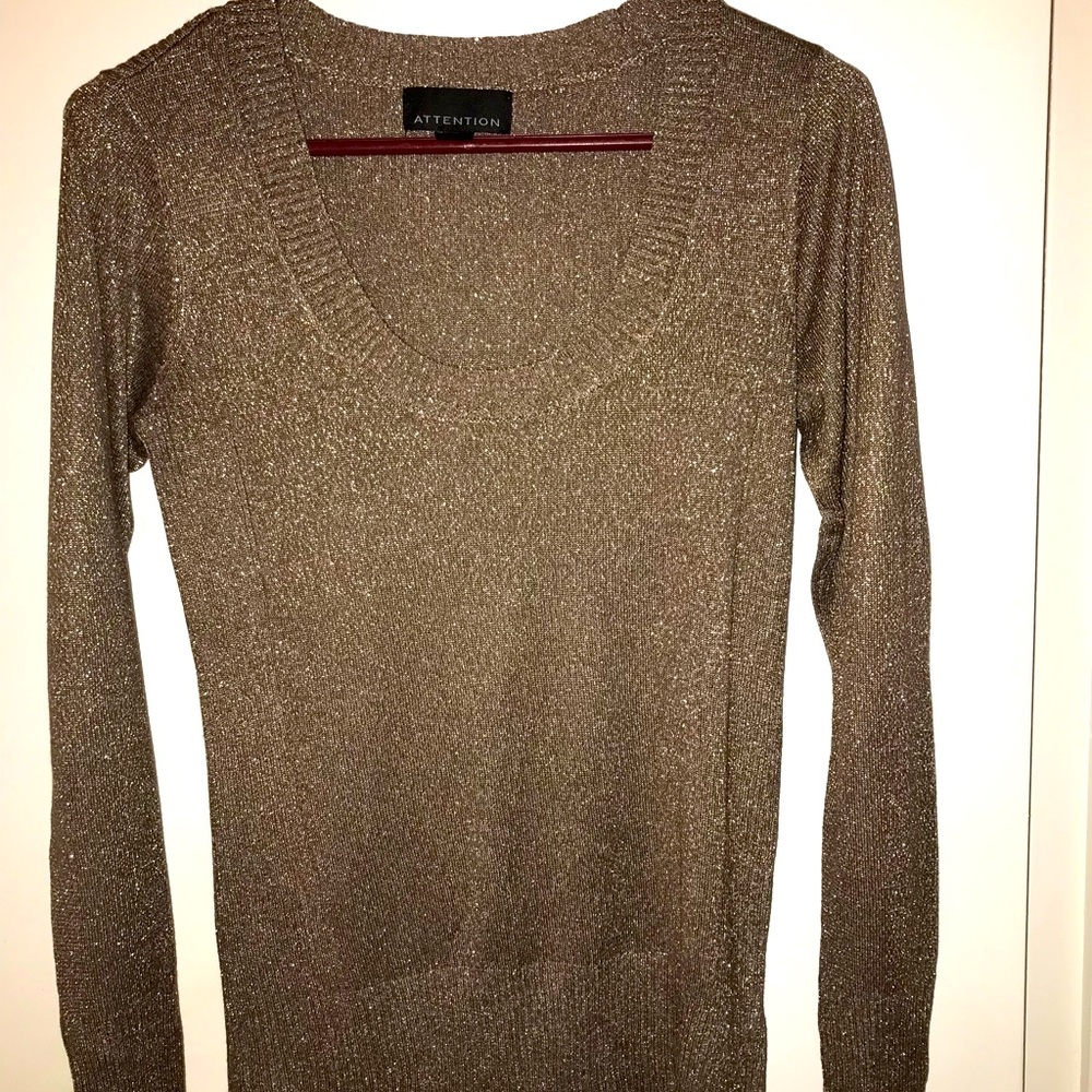 Women’s metallic gold long sleeved sweater